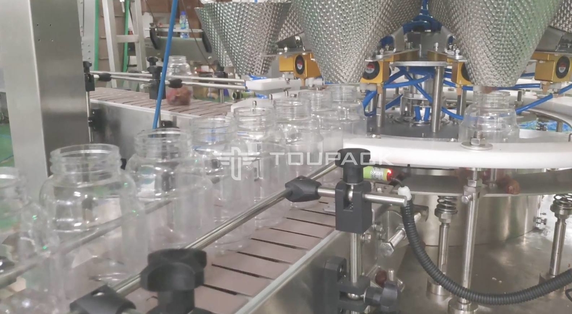 Impacchettatrice di riempimento di conteggio automatico per l'orso gommoso Candy di Premade Doypack della borsa del cuscino