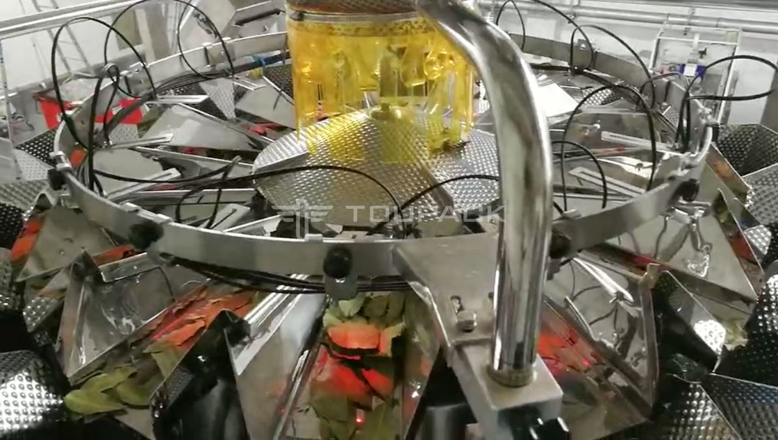 Macchina di imballaggio per pesatura verticale automatico per foglie di tè secche con 14 teste