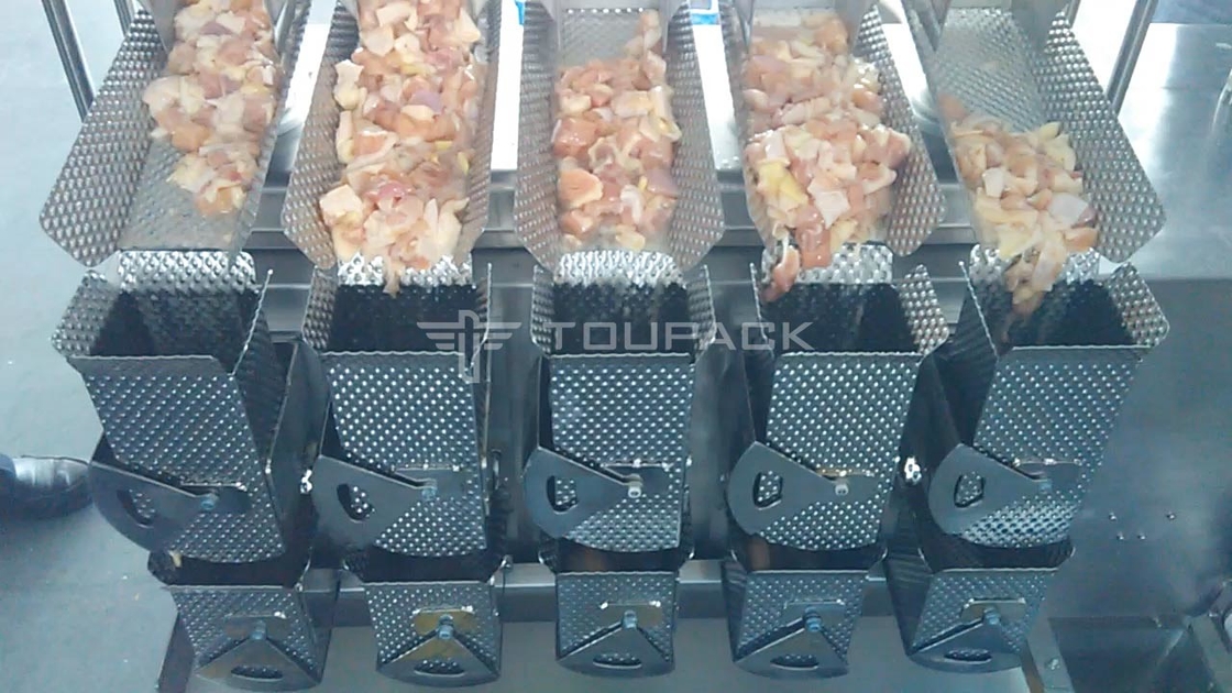 Macchina di imballaggio multifunzionale ad alta velocità 8 teste Pesatrice per cetrioli pollo in pezzi