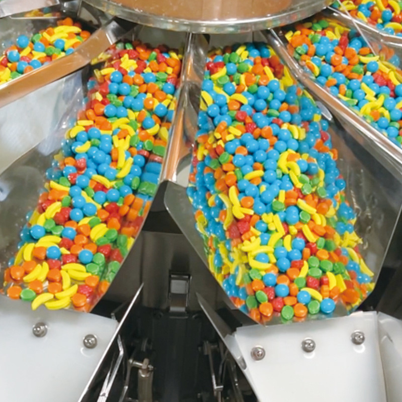 Macchine per l'imballaggio alimentare Macchine per l'imballaggio alimentare industriale Macchine funzionali per l'imballaggio dei barattoli di caramelle per il Doypack
