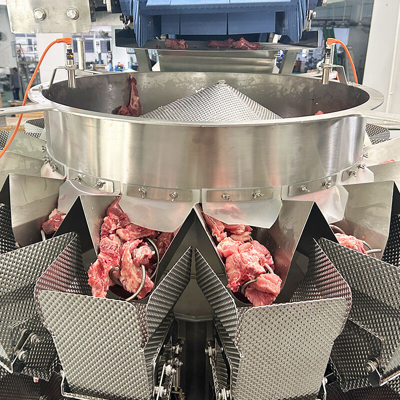 Linea automatica di confezionamento in vaschette con pesatrice a teste multiple e alimentazione a vite per prodotti surgelati