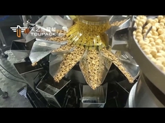 Sistema di pesatura, conteggio e confezionamento per miscele di frutta secca